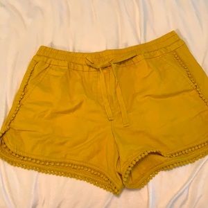 LOFT yellow running shorts